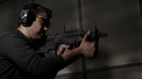 Shooting a rifle low angle view Stock Footage 61570911