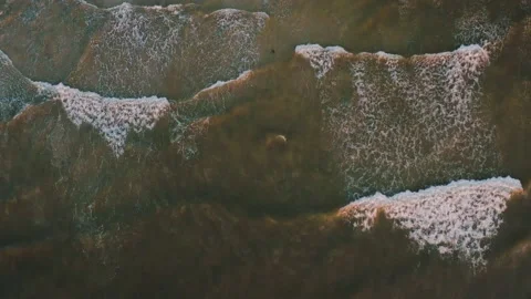 Shooting the rough waves at sunset with a drone. Stock Footage 138692542