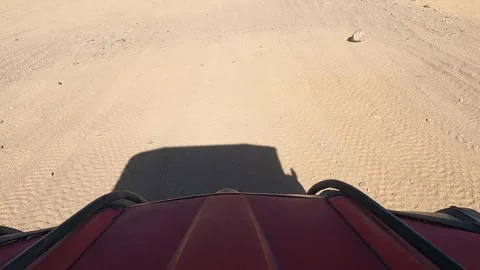 Shooting sand under buggy 動画素材 264058567