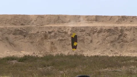 Shooting at a shooting range from a machine gun at growth targets in an open are Stock Footage 140039384