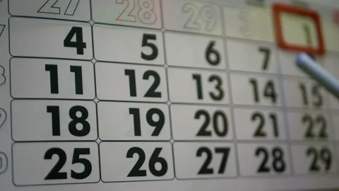 Shooting a simple calendar with one month and marking dates with a pointer. Video stock 201868425