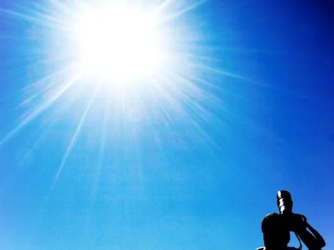 Shooting at the sun 스톡 사진