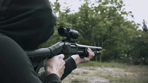 Shooting the target with the shotgun Stock Footage 115999624