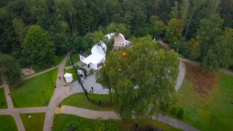 Shooting on top of a large scene located in the park. The scene is located in a Stock Footage 93819934