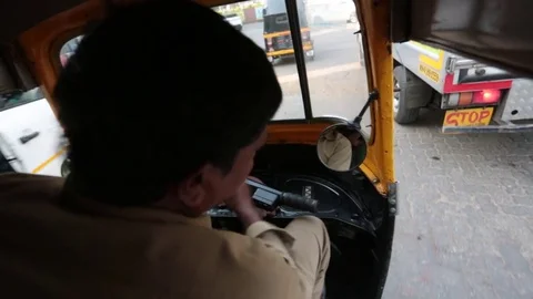 Shooting of the tuk-tuk cab while driving through the streets of Mumbai, India Stock Footage 83824008