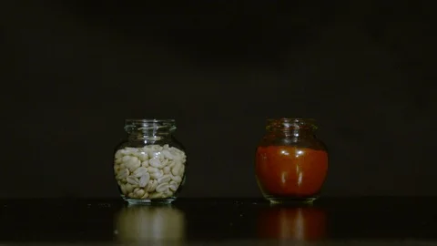 Shooting two jars, Ultra Slow Motion Stock Footage 86584455