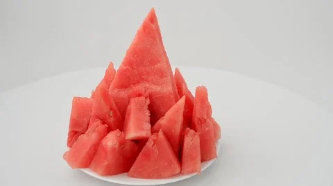 Shooting of a watermelon on a white background. Stock Footage