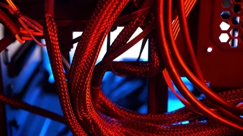 Shooting of wires inside PC, red colours, details, system illustration. Video stock 99354459