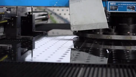 Shooting the work of an automatic machine that processes a metal part in Stock Footage 85119062