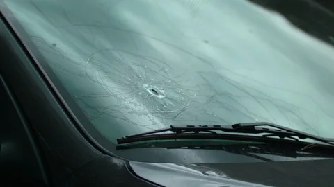 Shoots through the windshield of the car. Slow Motion 4K UHD. Video stock 107323821