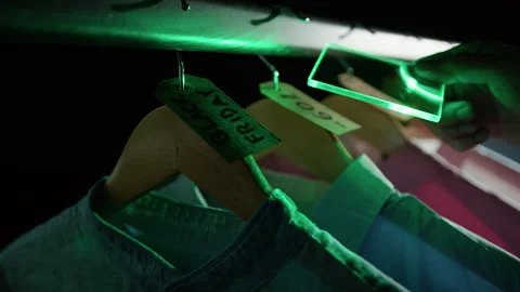 Shop Assistant checking discount tags for Black Friday Stock Footage 254770034