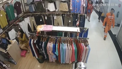 Shop assistant too busy doing her makeup to notice brazen shoplifter 스톡 동영상 105831965