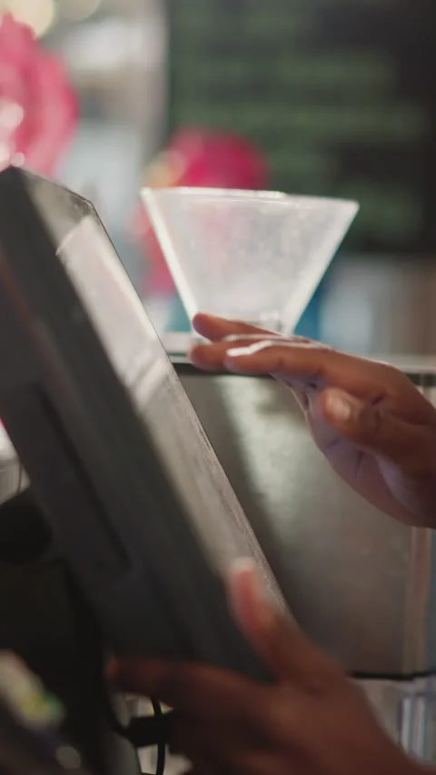 Shop assistant works on computer at counter Video stock 309064893