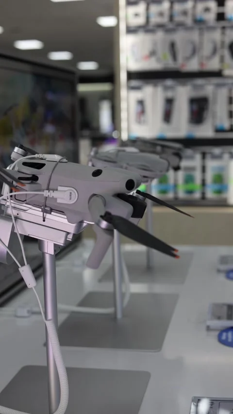 Shop with quadcopters on display vertical video Stock Footage 285648652