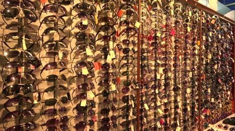 Shop with sunglasses. 4K. Stock Footage 40739328