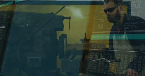 Shop tech tweaking lathe wheel and causing FileENCRYPTION code overlay checking Stock Footage 331821042