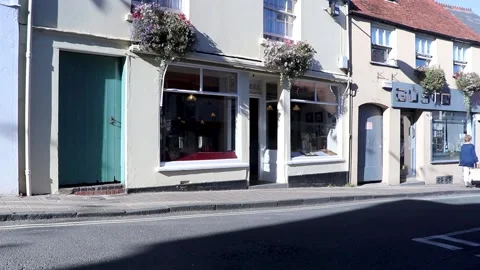 Shop view front high street summer Shaftesbury 스톡 동영상 136983399