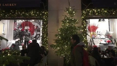 Shop window and Christmas tree on New Bond Street, London, England Stock Footage 223397485