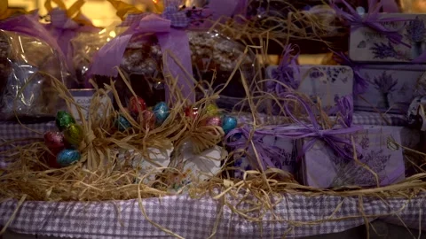Shop window decorated with chocolate eggs and Easter doves. Stock Footage 331201865