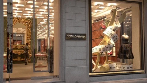 Shop window of a Dolce Gabbana shop in Milan – Montenapoleone area Stock Footage