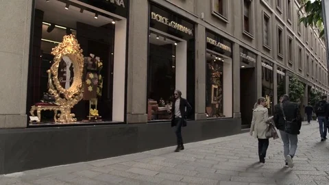Shop window of a Dolce Gabbana shop in Milan – Montenapoleone area Stock Footage
