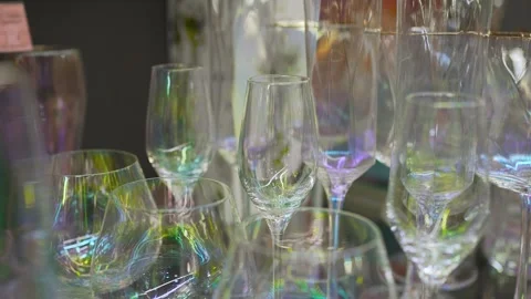 In the shop window, there are many mother-of-pearl wine glasses on display. Video stock 271580289