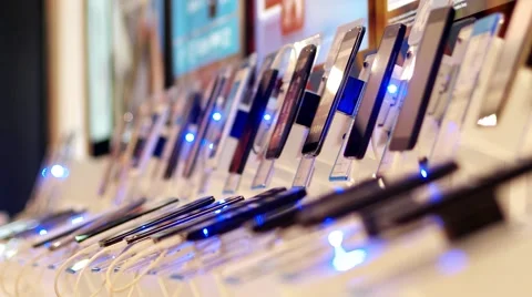 A shop window with touch screen mobile smartphones in mobile store dolly shot Stock Footage 61238522