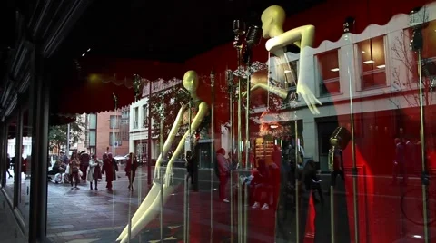 Shop window. The windows reflected people passing by Stock Footage 68015865