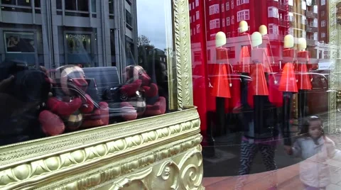 Shop window. The windows reflected people passing by Video stock 68015875