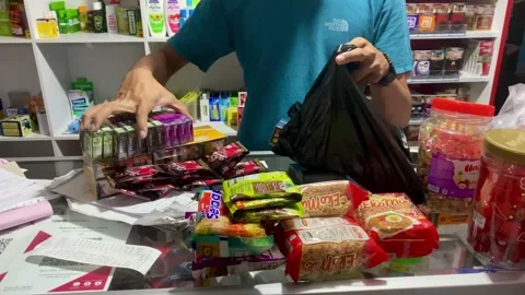 Shopkeeper Packing Customer Groceries Vídeos de archivo 346799095