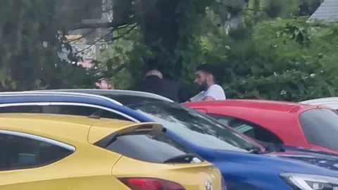 Shoplifter stopped by member of public confrontation after trying to escape Stock Footage 341369491