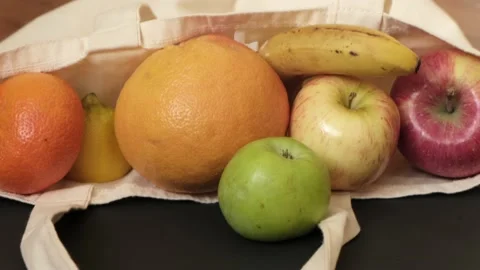 A shopper of fruit on table Stock-Footage 130533523
