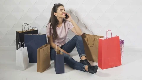 Shopper Talks on Phone 動画素材 81757719