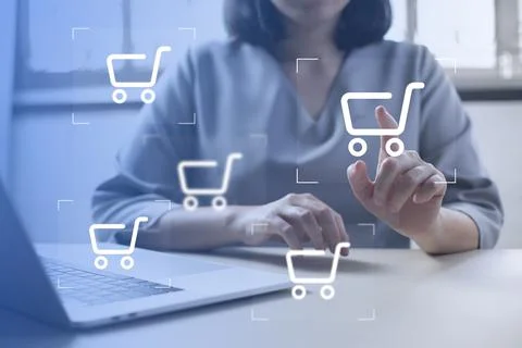Shopper using laptop and touch virtual screen online shopping. And online pay Stock Photos