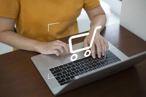 Shopper using laptop and touch virtual screen online shopping. And online pay Stock Photos