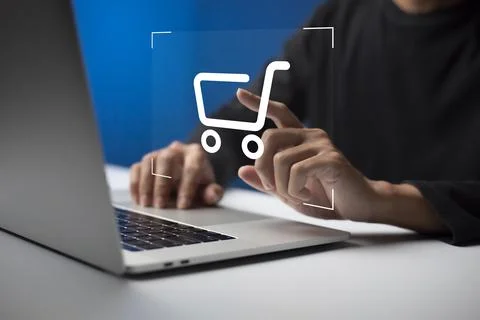 Shopper using laptop and touch virtual screen online shopping. And online pay Stock Photos