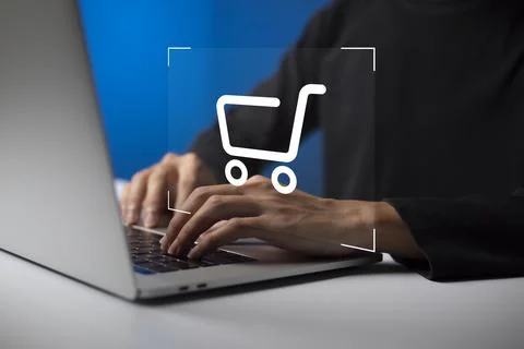 Shopper using laptop and touch virtual screen online shopping. And online pay Stock Photos