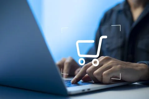 Shopper using laptop and touch virtual screen online shopping. And online pay Stock Photos