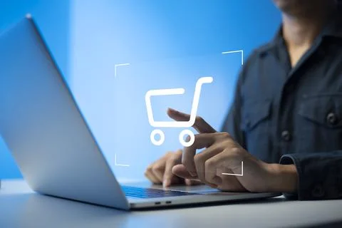 Shopper using laptop and touch virtual screen online shopping. And online pay Stock Photos