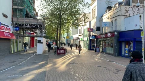 Shoppers and workers starting their day in North End, Croydon 4K Stock Footage 148036886