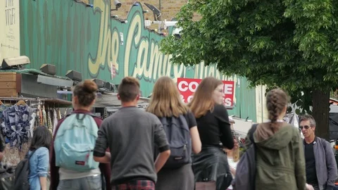 Shoppers browsing amongst the Stall holders in Camden Market, Chalk Farm Road Stock Footage 90234674