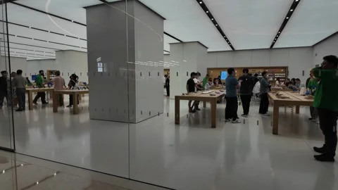 Shoppers Browsing Electronics in Modern Retail Tech Store Interior, China Stock Footage 336171696