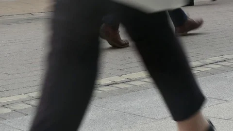 Shoppers feet in city center Stock Footage