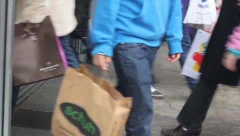 Shoppers go into a mall Stock Footage 10586567