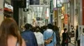Shoppers People Walk Crowd Pass Famous Brands Shopping Street Asian Store Osaka HD Footage