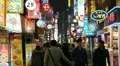 Shoppers in South Korea, Seoul Neon Street Electronic by night, Asian Shopping HD Footage