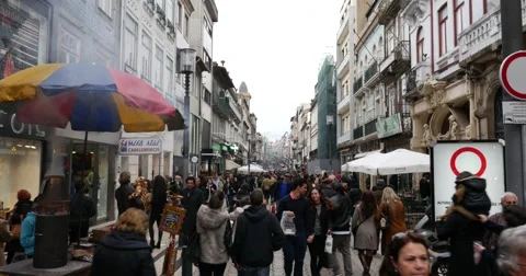 Shoppers stroll on Rua Santa Catarina pedestrian street. Stock Footage 59138628