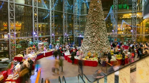 Shoppers visit the mall in VILNIUS, LITHUANIA Christmas Fair, December 23, 2014. Stock Footage 45490024