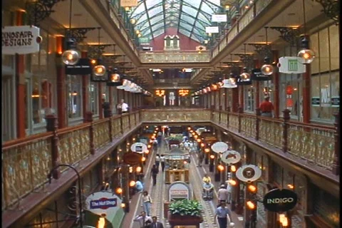 Shoppers walk in an elegant shopping mall in Australia. Stock Footage