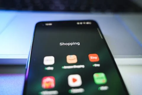 Shopping apps on phone screen. E-commerce and shopping concept. Amazon, Ebay Stock Photos